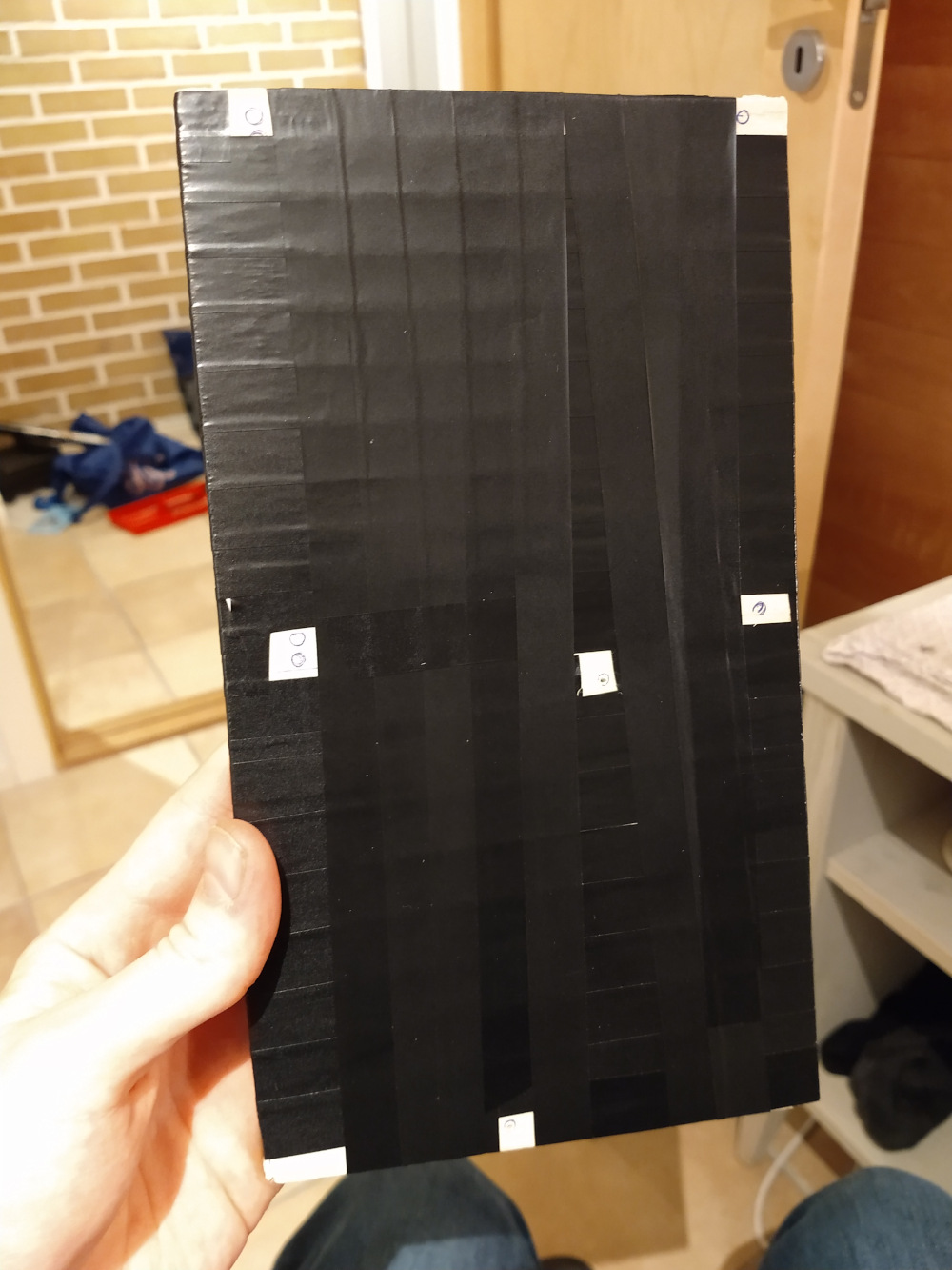 Plank covered in electric tape